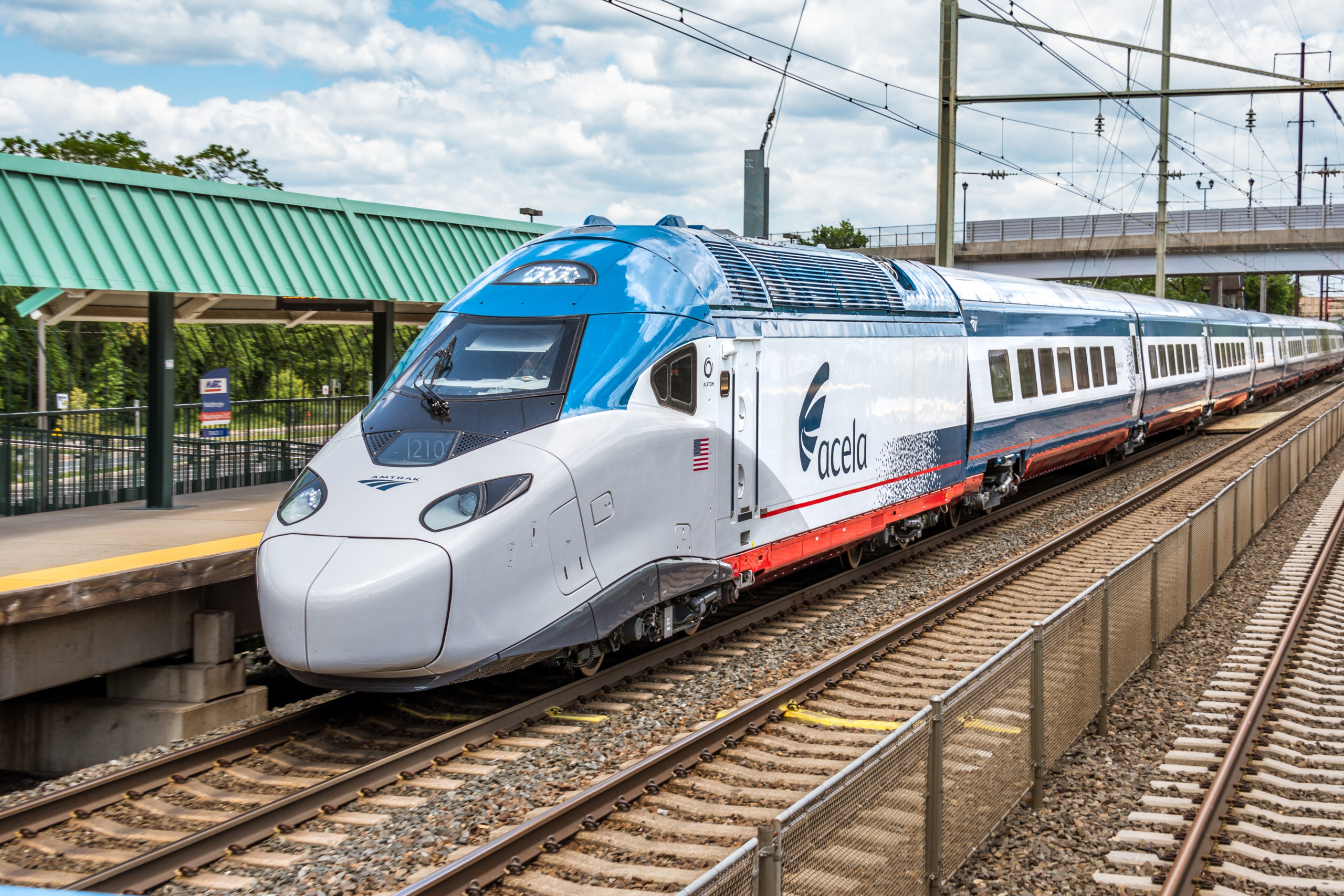 an Amtrak Acela 2 trainset sits at a platform in Maryland.